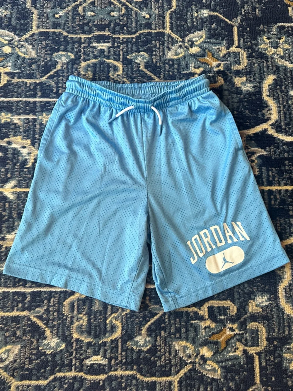 Jordan Sky Blue Mesh Athletic Shorts with White Logo